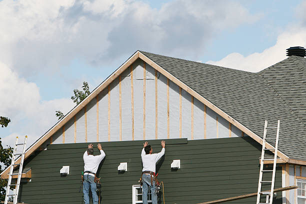 Professional Emergency Siding Repair technician working in Minerva, OH